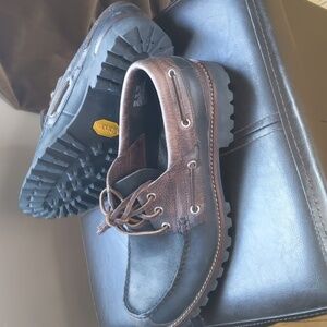 Brown and black Man's shoes